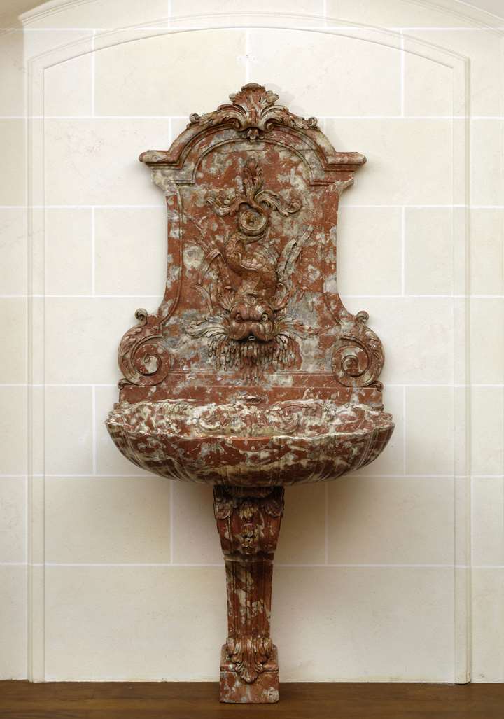 A baroque marble fountain 